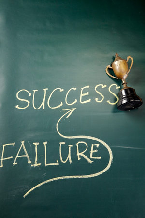 Success concept on blackboard - go straight to success and avoiding failureの写真素材