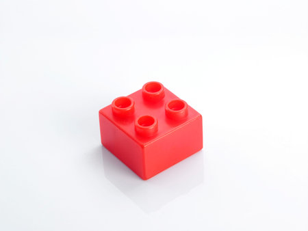 old Plastic building blocks on white background