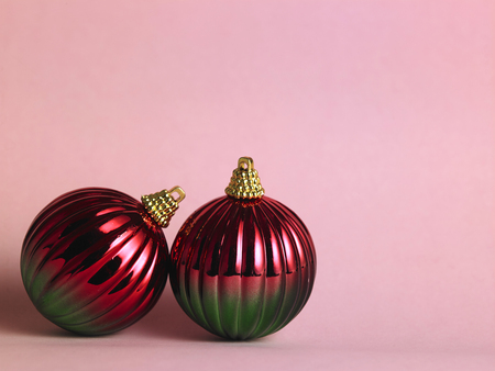 red christmas ornament on the pink backgroundの写真素材