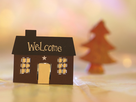 house shape light holder with christmas treeの写真素材