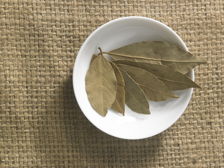 top view of the bay leaves on the burlapの写真素材