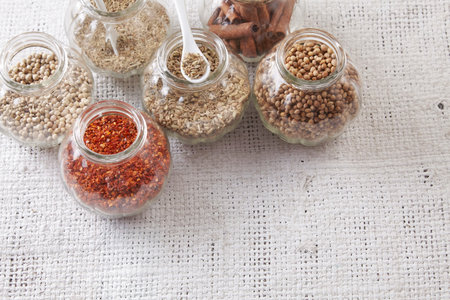 arrangement of spices on the whith sackclothの写真素材