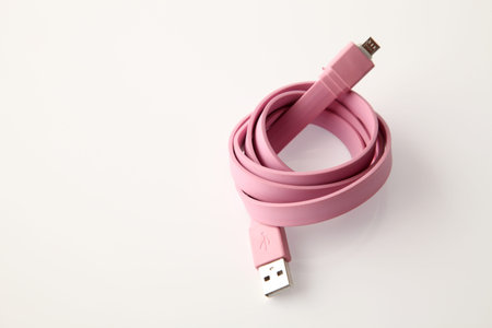 Folded USB cable for smartphone on white background