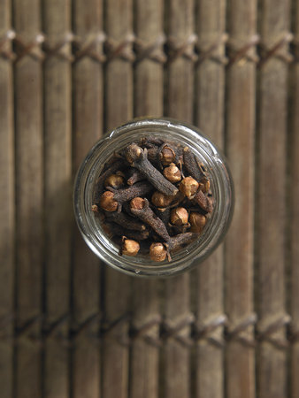 top view of the clove in glass containerの写真素材