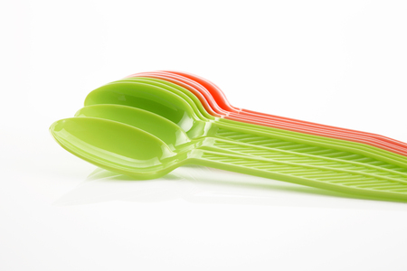 plastic spoon on the white backgroundの写真素材