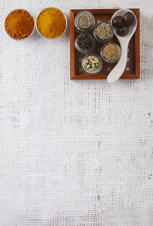 arrangement of spices on the white sackclothの写真素材
