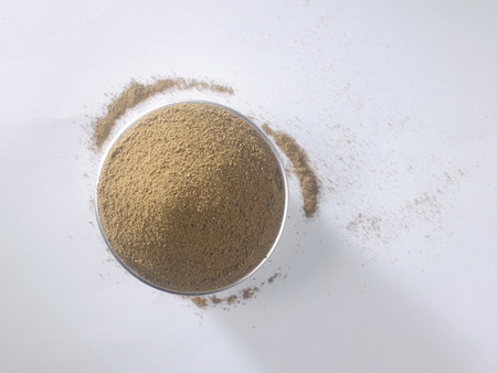 cinnamon powder on the white backgroundの写真素材