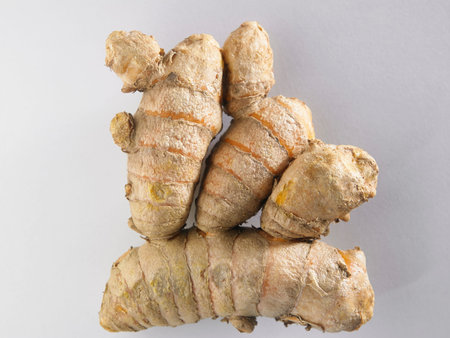 top view of the turmeric root on the white background