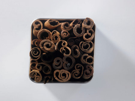 top view of cinnamon stick on the square container