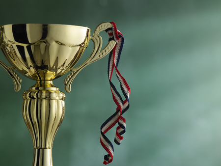 close up of the trophy in front of blackboardの写真素材