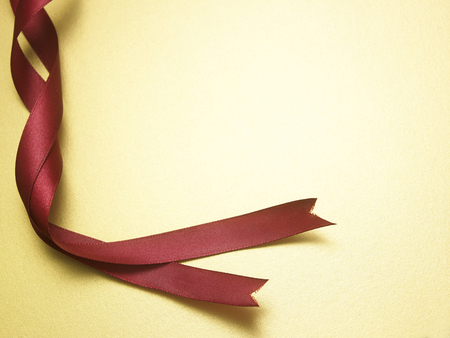 curve ribbon on the yellow backgroundの写真素材
