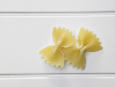 dry pasta on the wooden tableの写真素材