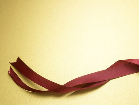 curve ribbon on the yellow backgroundの写真素材