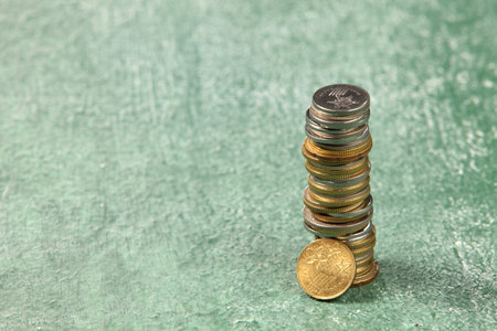 stack of coins on the blackboard