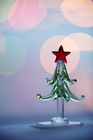 miniature decoration christmas tree with bokeh backgroundの写真素材