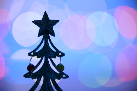 silhouette miniature decoration christmas tree with bokeh backgroundの写真素材