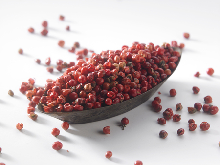 red peppercorn on the white backgroundの写真素材