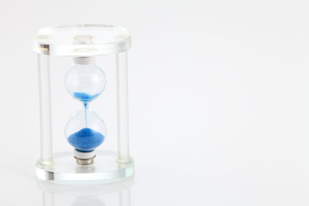 crystal hourglass on the white background
