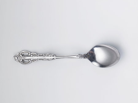 used spoon on the white background