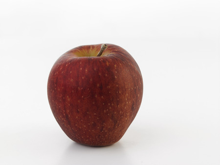 red apple on the white backgroundの写真素材