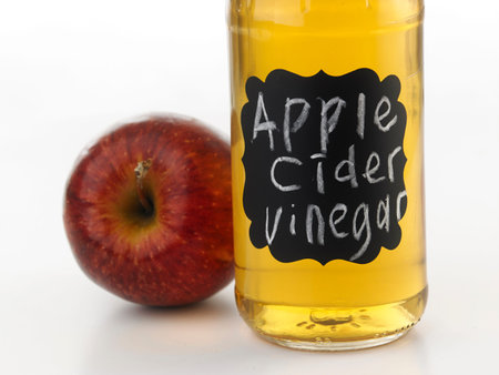 apple cider vinegar on the white background