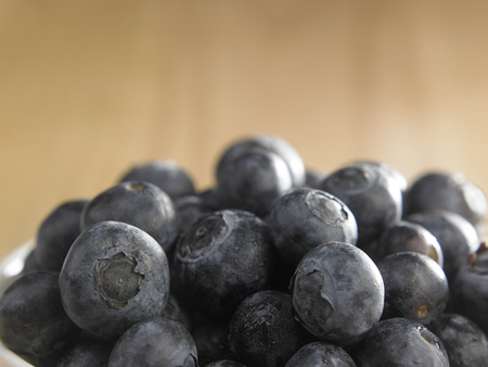 group of blue berry on the wooden backgroundの写真素材