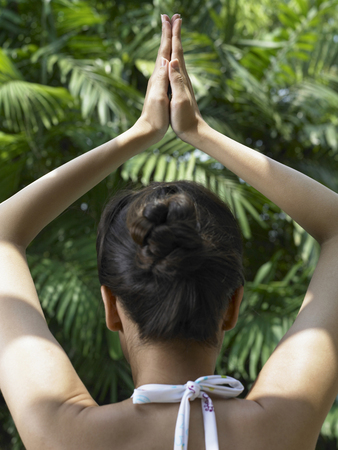 Woman practising yogaの写真素材