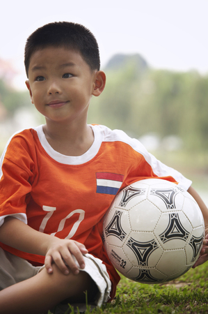 Boy with soccer ballの写真素材