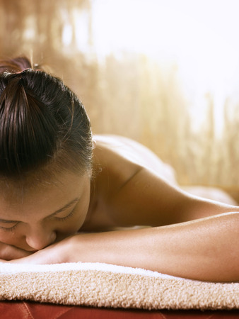 woman receiving spa treatmentの写真素材