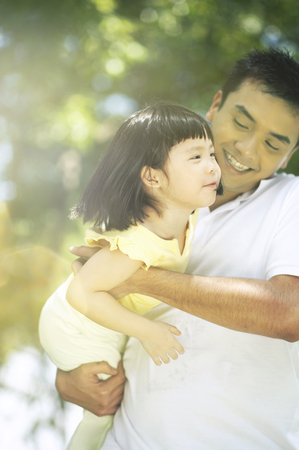 father and daughter in the parkの写真素材