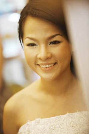 Close up view of bride with her toothy smileの写真素材