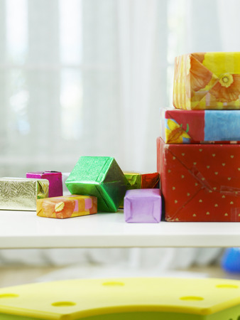 stack of presents on top of tableの写真素材