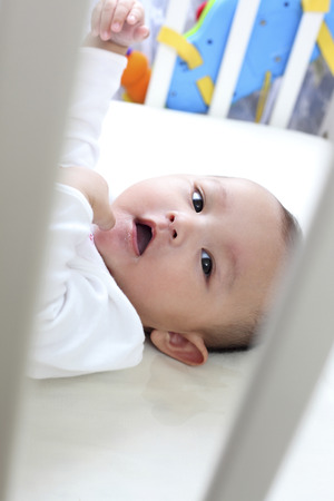 Selective focus of baby inside cradleの写真素材