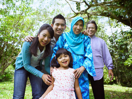 family playing games at the park