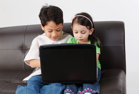 children sharing computer