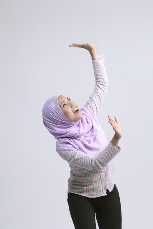 Woman with hand gestureの写真素材