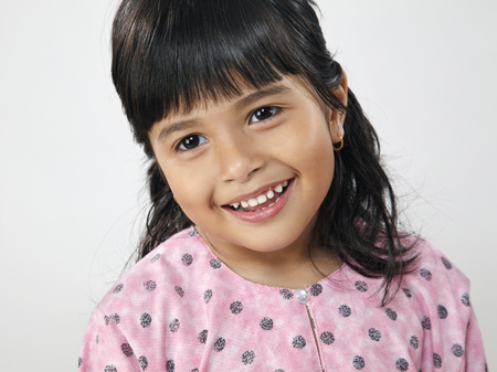 Portrait of Malay girl, smilingの写真素材