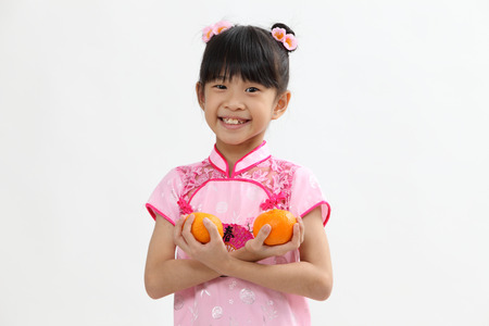 chinese girl with traditional clothing greetingの写真素材