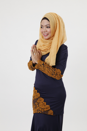 malay woman with tudung greetingの写真素材