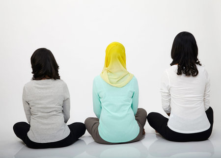 back view of malaysian women sitting