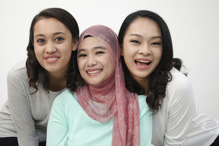 Close up of Harmony malaysian happy laughing at cameraの写真素材