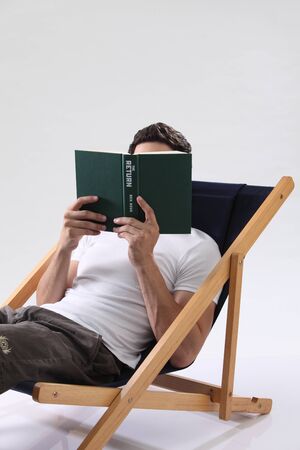 man reading bookの写真素材