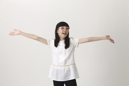 girl hand wide open waiting for a hugの写真素材