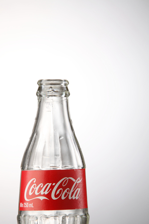 KUALA LUMPUR, MALAYSIA -May 7TH, 2015. Empty Coca Cola bottle.American multinational beverage corporation.のeditorial素材