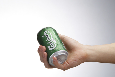 Kuala Lumpur,Malaysia 9th April 2015,hand holding a can of the carlsberg beer drinkのeditorial素材