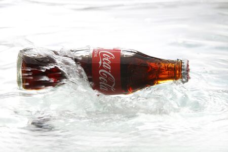 kuala Lumpur,Malaysia 16th April 2015,Editorial photo of Classic Coca-Cola Bottle with water splashのeditorial素材