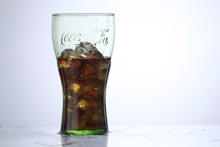 KUALA LUMPUR, MALAYSIA - Feb 17, 2016 glass of the coca cola soft drink with ice cubeのeditorial素材