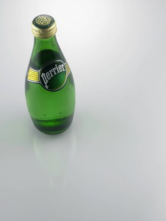 KUALA LUMPUR, MALAYSIA - June19TH 2015,Perrier Natural Mineral Water on white background.のeditorial素材
