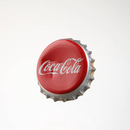 KUALA LUMPUR, MALAYSIA - june 6TH, 2015.Coca-Cola classic cap isolated on white background. Coca-cola is the world's most selling carbonated soft drinkのeditorial素材