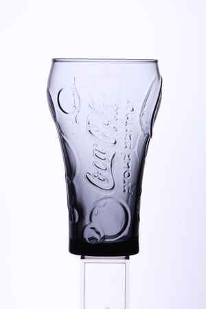 KUALA LUMPUR, MALAYSIA - Feb 16, 2016 Empty Coca Cola glassのeditorial素材